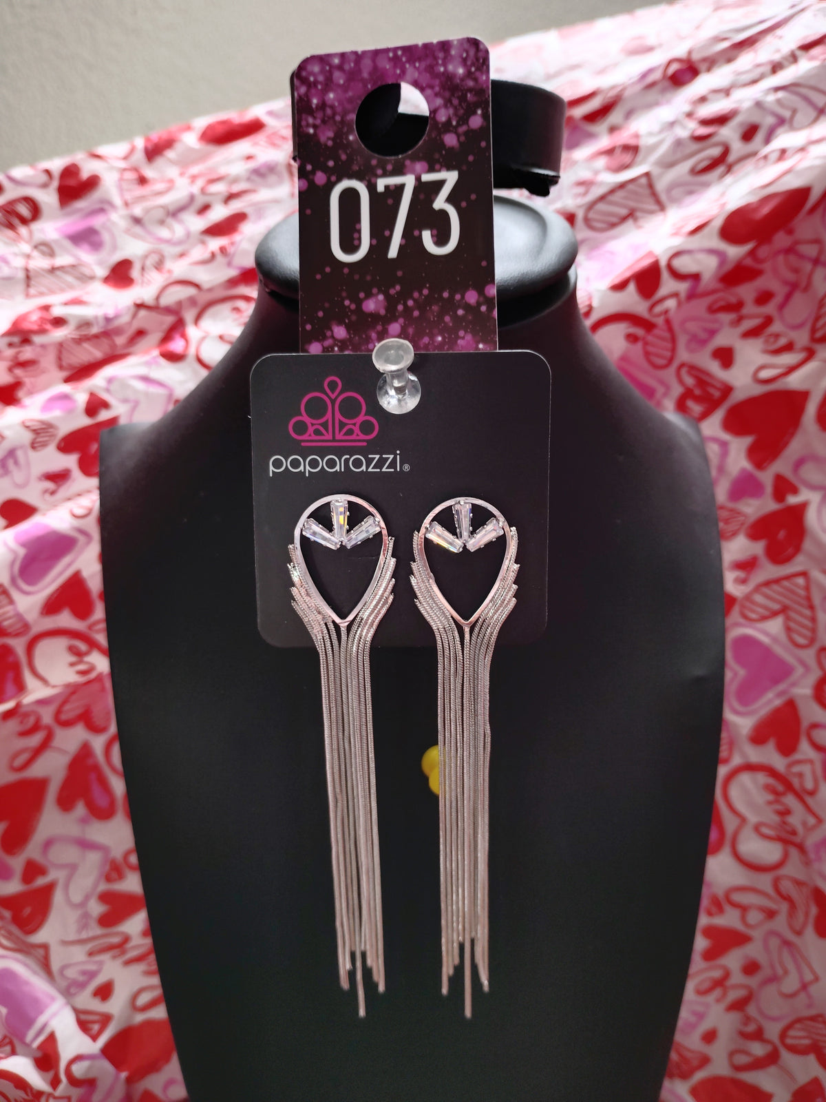 Elongated white earrings