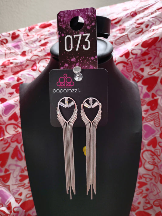 Elongated white earrings